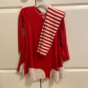 Red tunic with white details on bottom and matching leggings